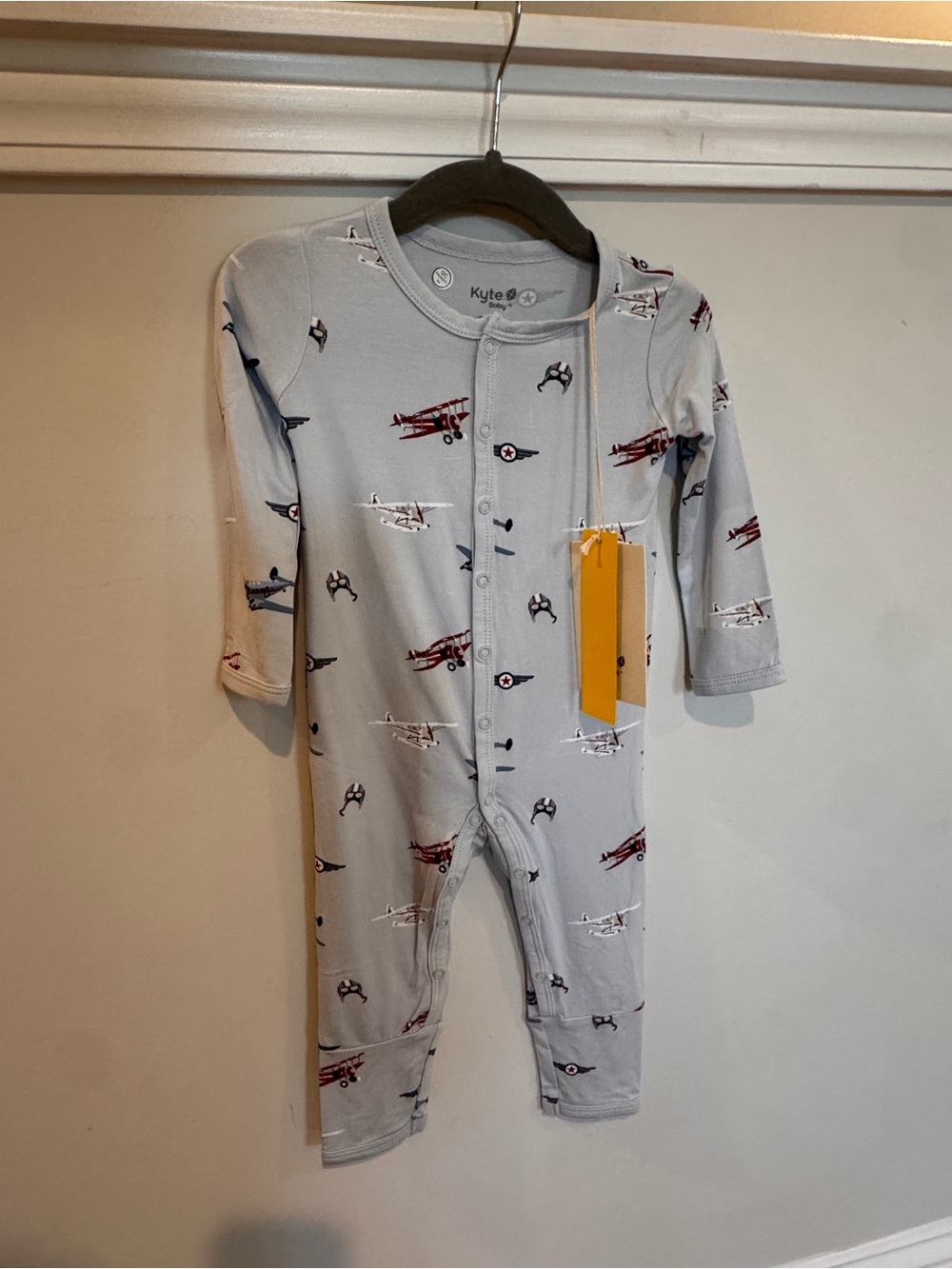 Kyte BABY Light Gray Airplane Print Footie with Red & Navy Accents